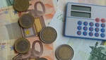 Dinero Y Una Calculadora Def